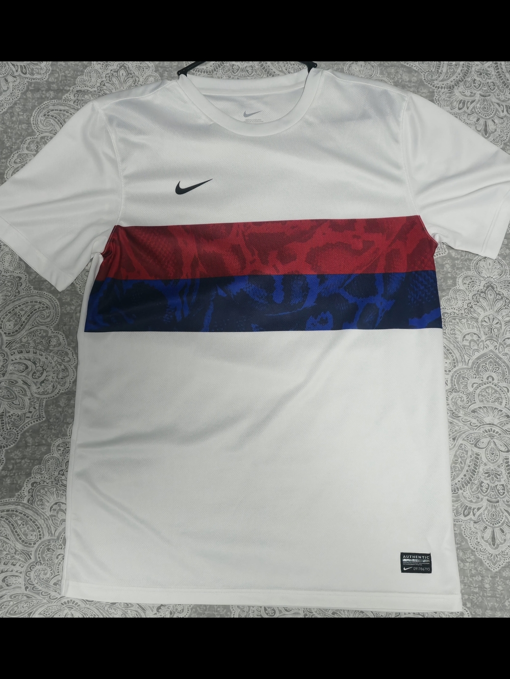 Nike Men’s White Short-Sleeve Performance Tee with Red & Blue Chest Stripes